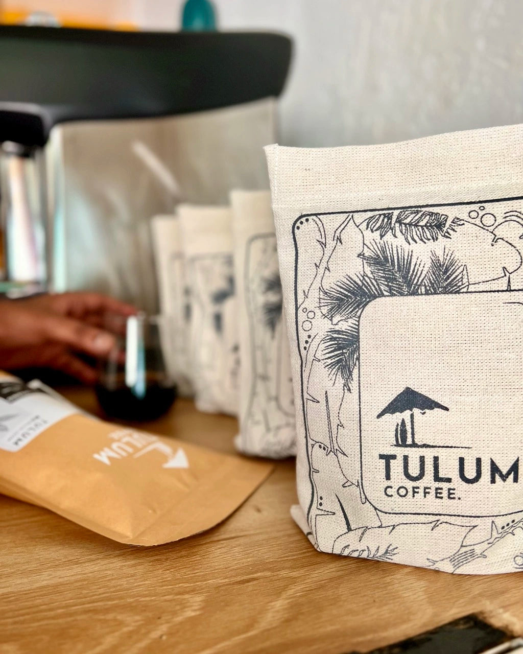 Pulneys 100% Organic And Arabica Coffee Beans by Tulum Coffee in a grey cloth bag with dark and Fruity notes.